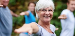Older lady doing yoga optical